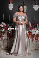 فستان سهرة فضي بلمسة أنوثة