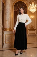 فستان أنثوي يجمع بين الرقي والبساطة من ريڤــان