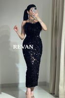 فستان أسود ترتر فاخر ولمسة ريش