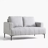 كنبة نوڤيرا بمقعدين قماش رمادي فاتح بأرجل معدن أسو...