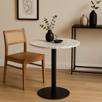 طاولة خشب دائرية بقاعده معدن لون أبيض x أسود مقاس...