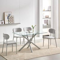 طاولة طعام سطح زجاجية 4 كراسي مبطنة بلون رمادي فات...