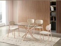 طاولة طعام مستطيلة سطح زجاجية 4 كراسي مبطنة بلون ب...