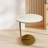 طاولة جانبية مزينة بتشطيب رخام و هيكل معدني لون ذه...