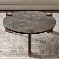 طاولة قهوة لوسّو دائرية بسطح سيراميك على ثلاثة أرج...