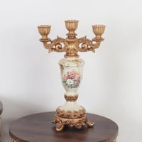 شمعدان لطافة ريزن باللمسه الايطالية ذهبية لامعة وب...