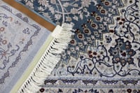 سجادة أنامل من هياف بتصميم ذات نقوشات راقية لون از...