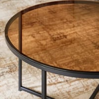 طاولة قهوة تورڤيلا مستديرة بسطح زجاجي و هيكل معدن...