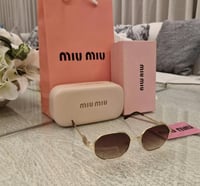 نظارة نسائية ميو ميو عدسة بني