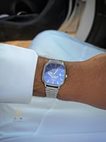 ساعة رجاليه بتصميم شعار الهلال