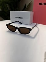 نظارة miu miu إطار أسود - عدسة بني