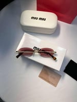 نظارة miu miu عدسه وردي