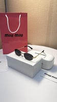 نظارة miu miu أطار ذهبي عدسة أسود