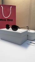 نظارة miu miu أطار ذهبي عدسة أسود