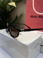 نظارة miu miu إطار أسود - عدسة بني