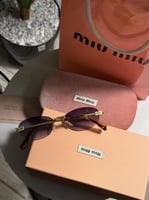 نظارة MIU MIU اطار ذهبي تايقر عدسة مدرج