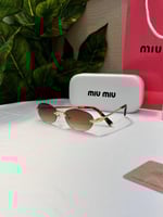 نظارة miu miu أطار ذهبي عدسة بني مدرج