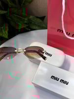 نظارة miu miu أطار ذهبي عدسة بني مدرج