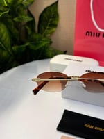 نظارة miu miu أطار ذهبي عدسة بني مدرج