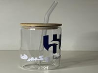 كوب بملصق بعبارة زعيم أسيا وكبيرها