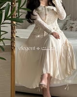 فستان دانتيل بيج مكسر أنيق بخصر محدد وتفاصيل ذهبية