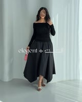فستان أسود اوف شولدر بقصة أنثوية فاخرة