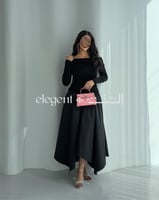 فستان أسود اوف شولدر بقصة أنثوية فاخرة