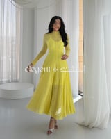 فستان دانتيل أصفر طويل بأكمام طويلة وقصة أنثوية نا...