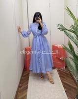 فستان سماوي ناعم مطرز باللؤلؤ - تصميم أنثوي أنيق