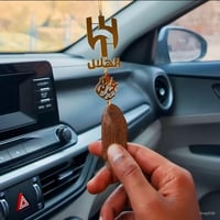 تعليقة بالاسم مع شعار نادي الهلال وكسرة العود