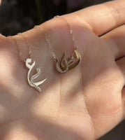 سلسال حرفين مطلي بذهب عيار 21