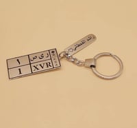 ميدالية مفتاح لوحة سيارة مع عبارة