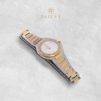 ساعة نسائية ألماس فضي ذهبي مينا أبيض ماركة فايلت