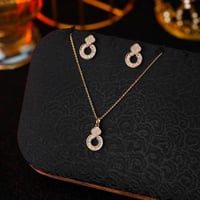 تعليقة مع حلق زركون ذهبي من فايلت