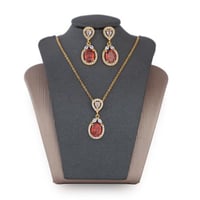 تعليقة مع حلق زركون ذهبي فص أحمر من فايلت