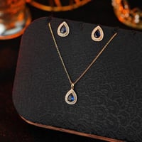 تعليقة مع حلق زركون ذهبي فص كحلي من فايلت