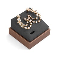 حلق زركون ذهبي من ماركة فايلت