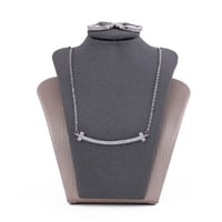 تعليقة مع حلق زركون فضي من ماركة فايلت