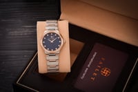 ساعة نسائية ألماس فضي نحاسي مينا كحلي ماركة فايلت