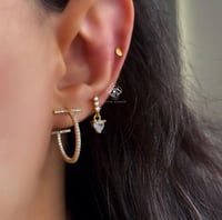 اقراط تيفاني T هوب زركون