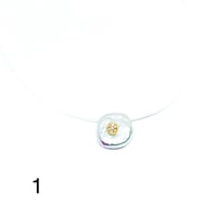 سلسله شفافه مع صدف