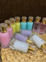 مجموعة عطور المسك درزن 12 حبه 50 مل توفر شكل العلب...