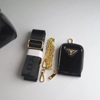 شنطة برادا ري اديشن لامع B112