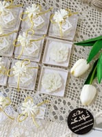 توزيعات 12 شموع الوردة برائحة الاوركيد