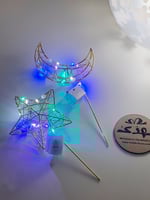 اعواد الهلال والنجم المضيئة