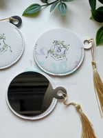 توزيعات مرايا جلد دائري