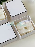 شموع حقيبة شانيل أبيض