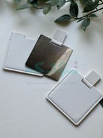 درزن مرايا جلد مربع