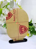 لوح اكريلك A5 بيضاوي شفاف مع قاعدة ( 14.5*20.3سم )