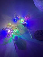 اعواد الهلال والنجم المضيئة